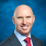Charles Simon at Stifel